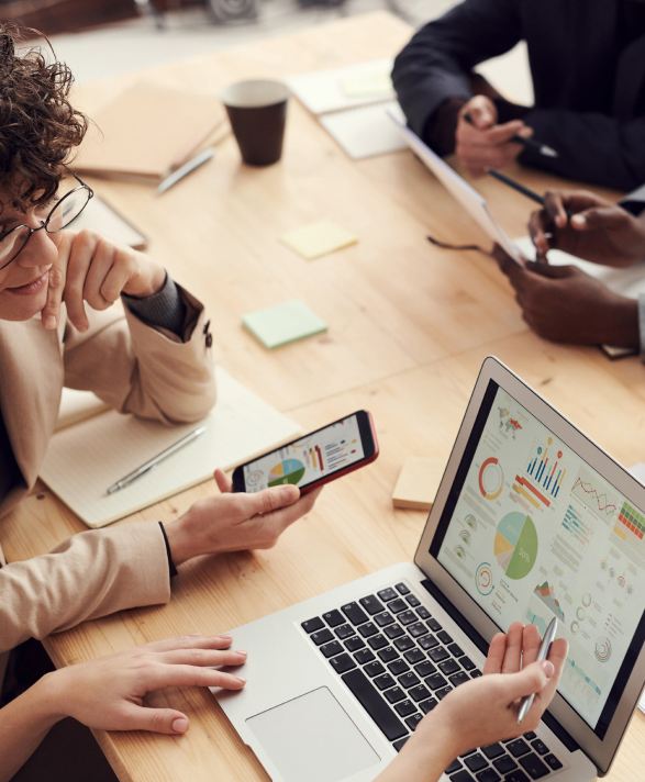 Entrepreneurs reviewing analytics at a collaborative workspace